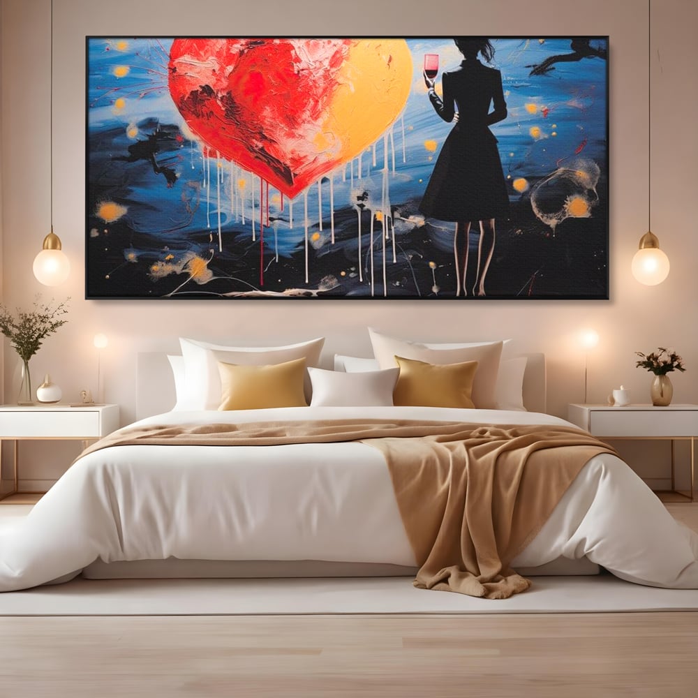 Tablou canvas cu tablou canvas cu femeie si inima uriasa, in rama de aluminiu negru, pe perete intr-un dormitor